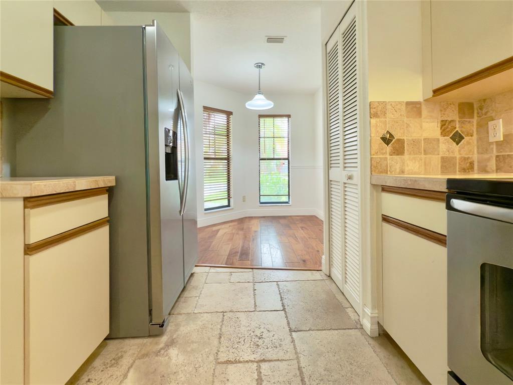 10253 Riverbend Terrace Boca Raton, FL 33498 - Photo 4 of 33 a bathroom with a tub and shower