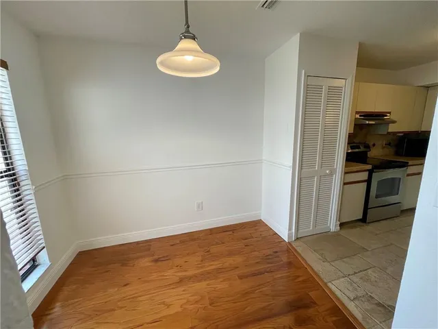 a view of a kitchen with a sink