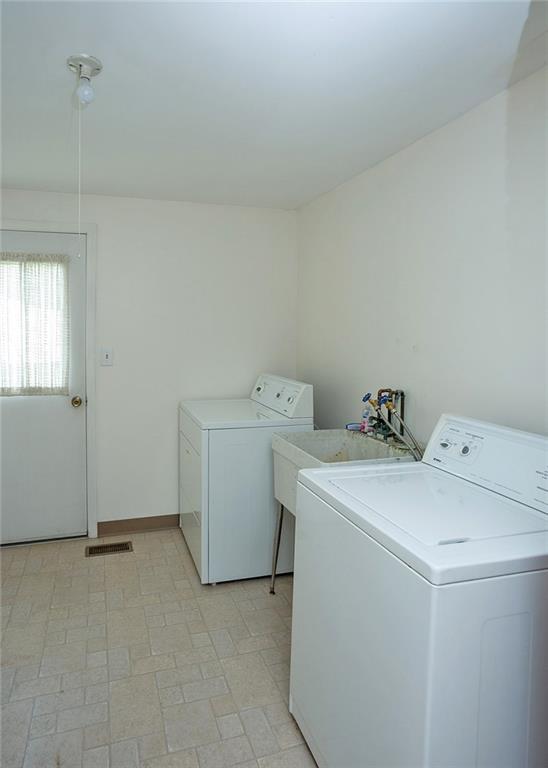 5876 Claridge Export Road Export, PA 15632 - Photo 14 of 25 Convenient first floor laundry room plus mudroom.