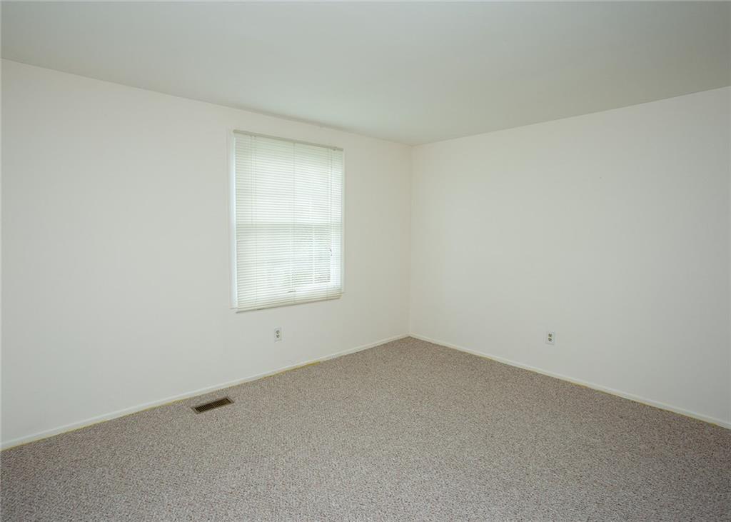 5876 Claridge Export Road Export, PA 15632 - Photo 16 of 25 Each of four sizable bedrooms is a neutral canvas with wall to wall carpet.