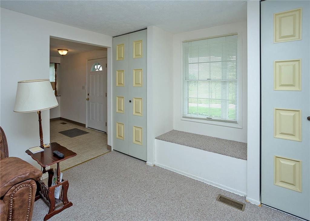 5876 Claridge Export Road Export, PA 15632 - Photo 4 of 25 The family room is located just off the entry.