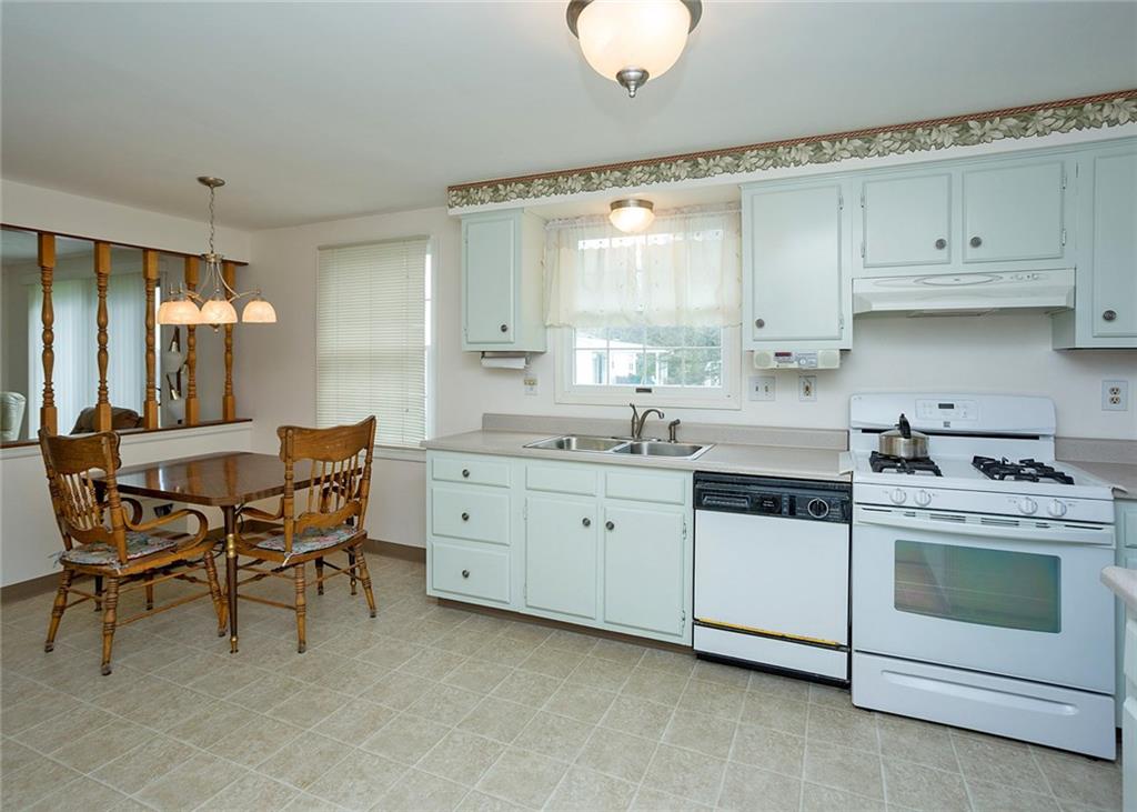 5876 Claridge Export Road Export, PA 15632 - Photo 7 of 25 In the kitchen you will find tons of counter space and cabinetry.