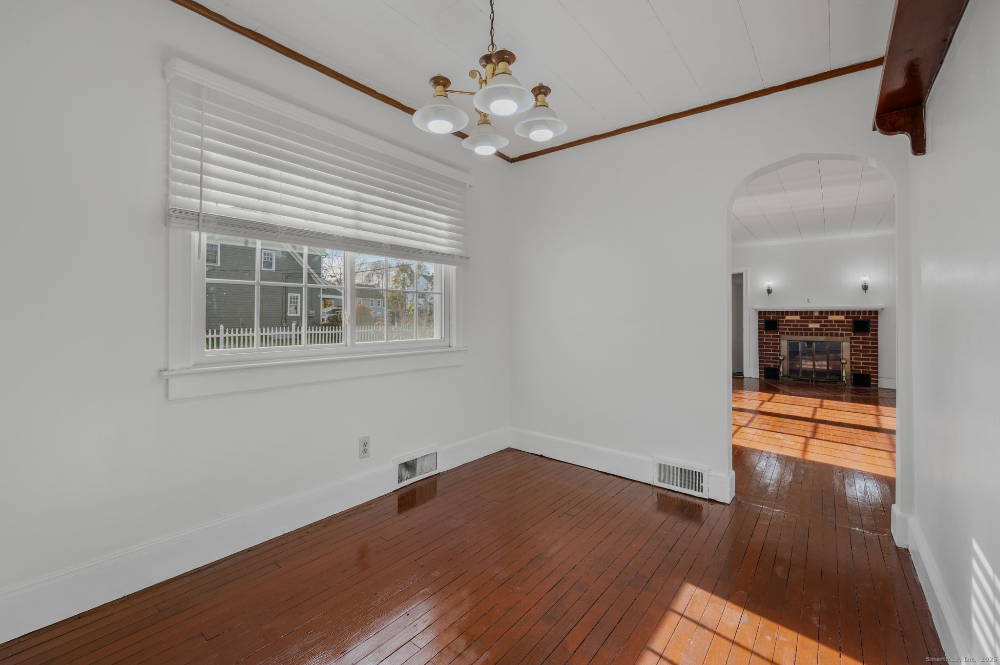 139 Pennsylvania Avenue East Lyme, CT 06357 - Photo 11 of 28 a view of empty room with wooden floor and fan