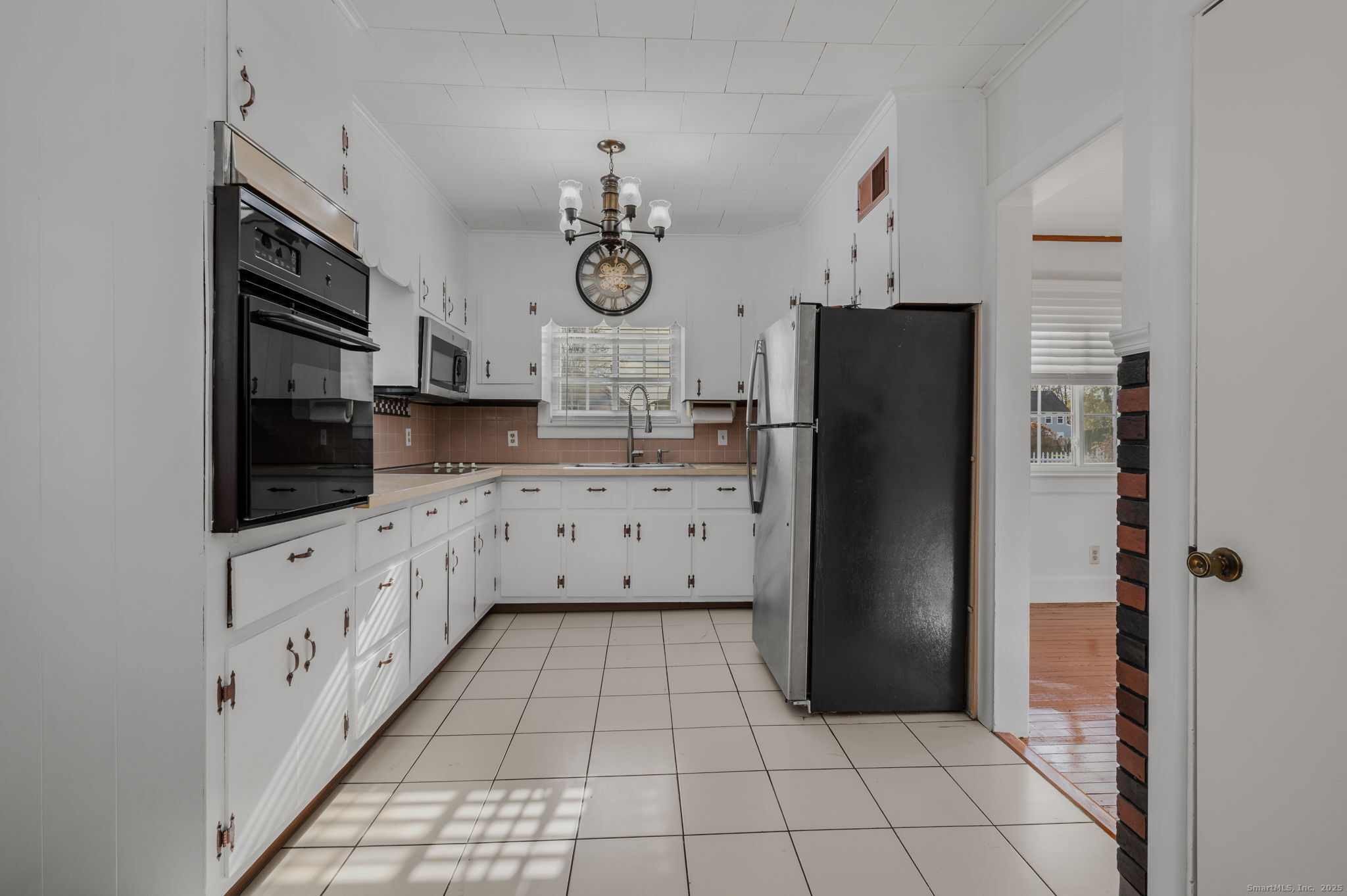 139 Pennsylvania Avenue East Lyme, CT 06357 - Photo 13 of 28 a kitchen with stainless steel appliances a refrigerator and a stove top oven