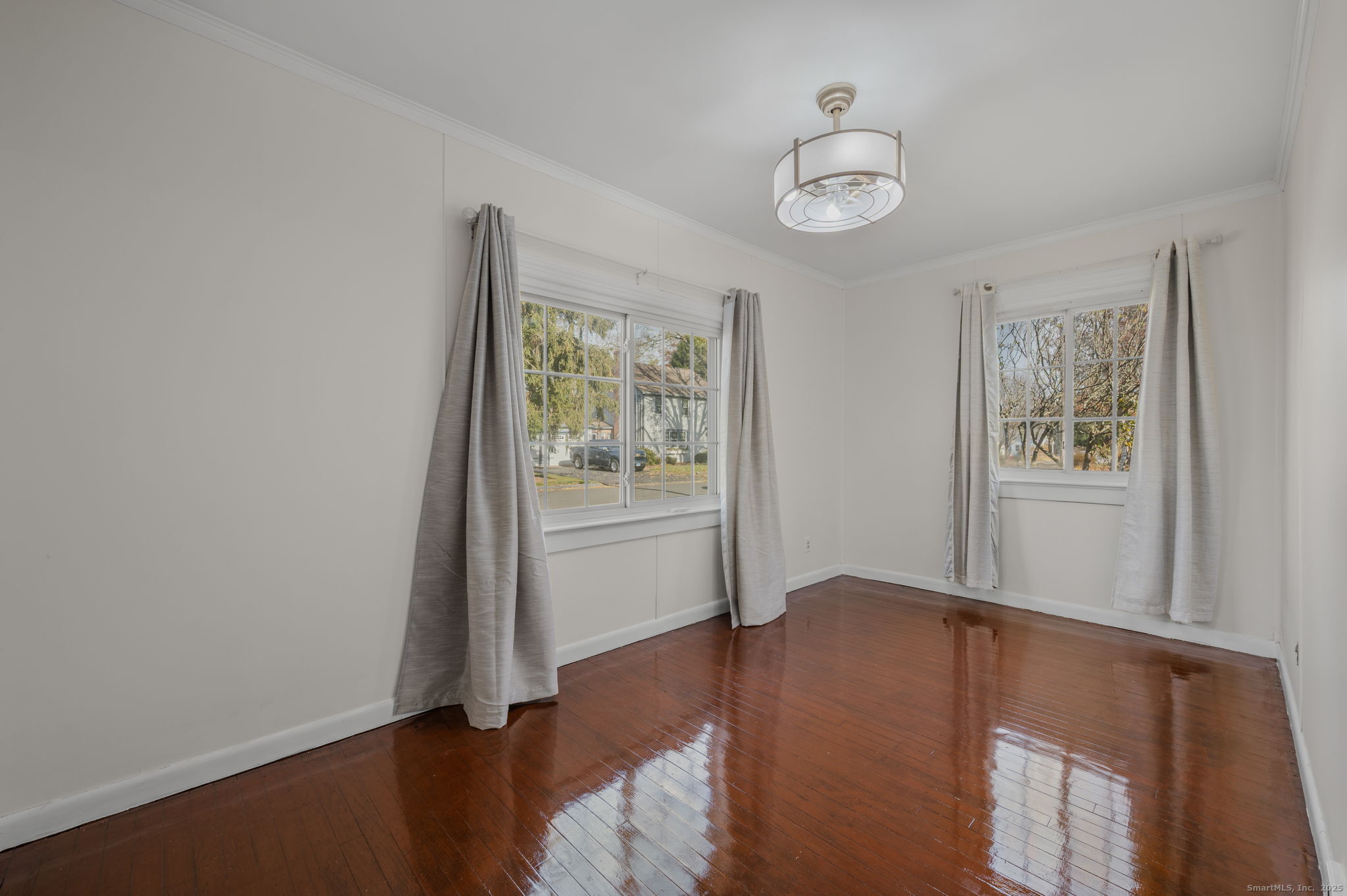 139 Pennsylvania Avenue East Lyme, CT 06357 - Photo 17 of 28 a view of livingroom with hardwood floor and window
