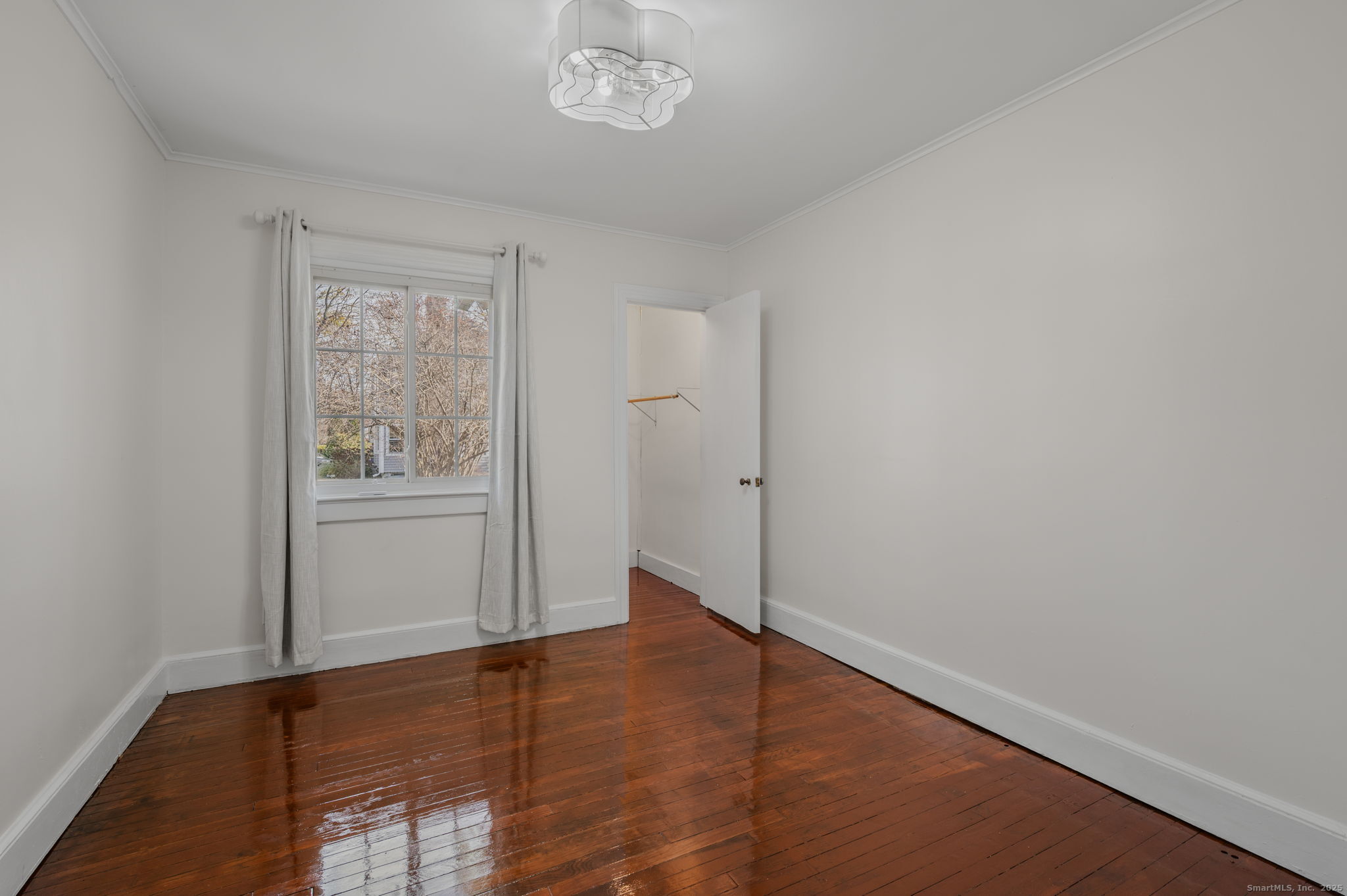 139 Pennsylvania Avenue East Lyme, CT 06357 - Photo 20 of 28 an empty room with windows