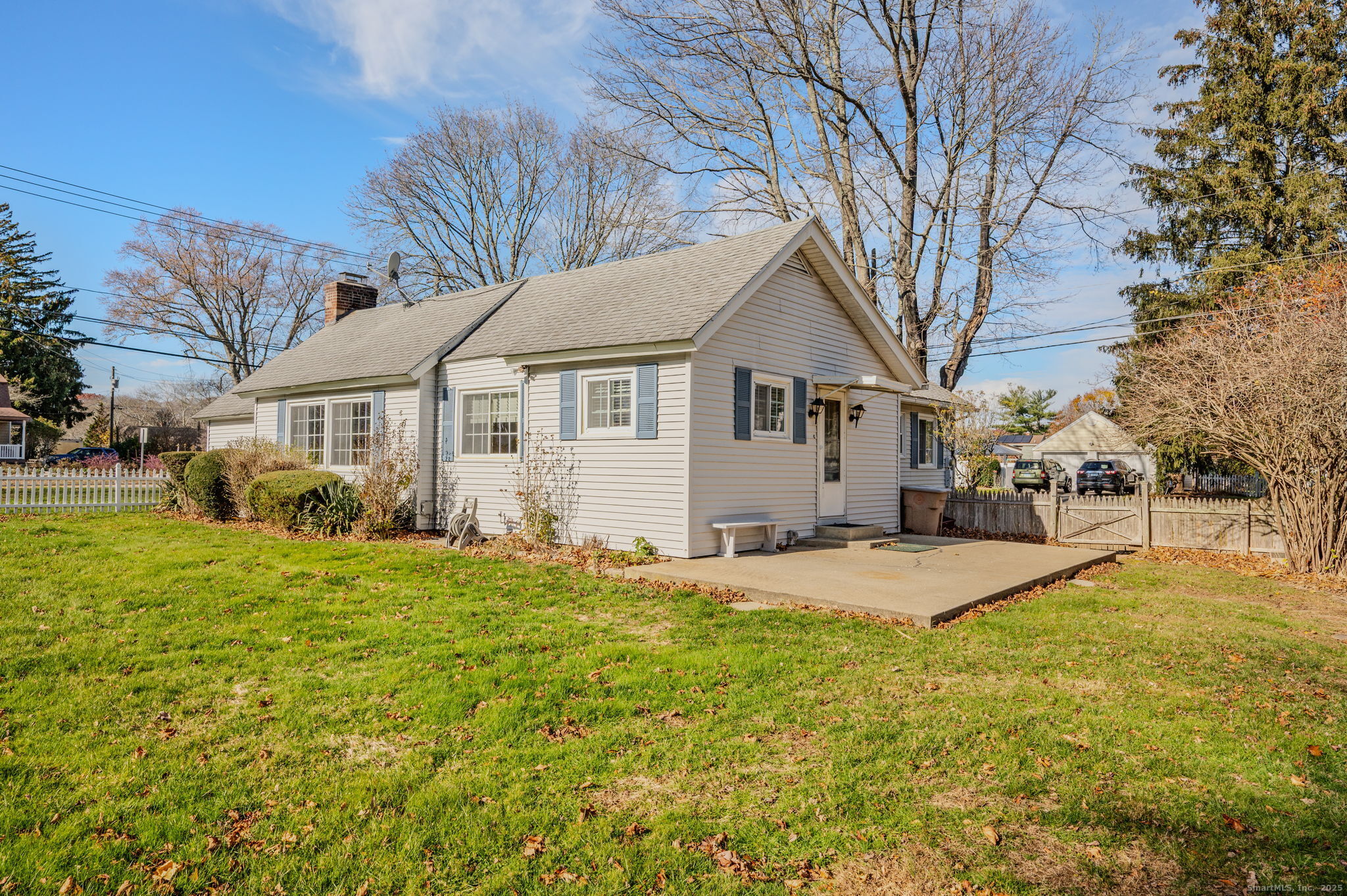 139 Pennsylvania Avenue East Lyme, CT 06357 - Photo 23 of 28 a front view of a house with a yard and trees
