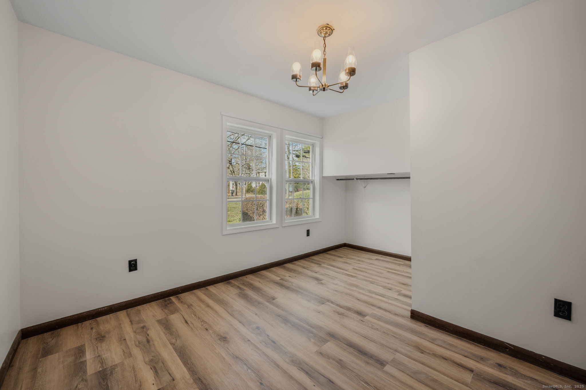 139 Pennsylvania Avenue East Lyme, CT 06357 - Photo 8 of 28 a view of an empty room with a window