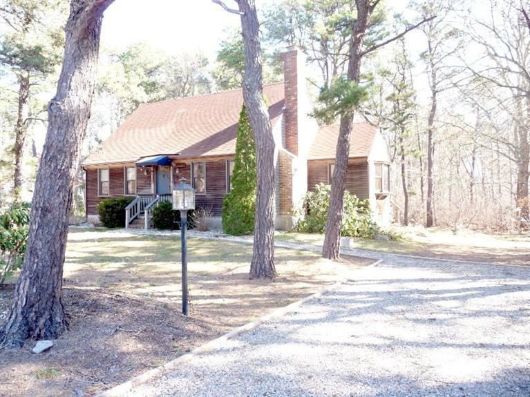 440 Hay Road Eastham, MA 02642 - Photo 3 of 25 a view of a house with a yard and tree s