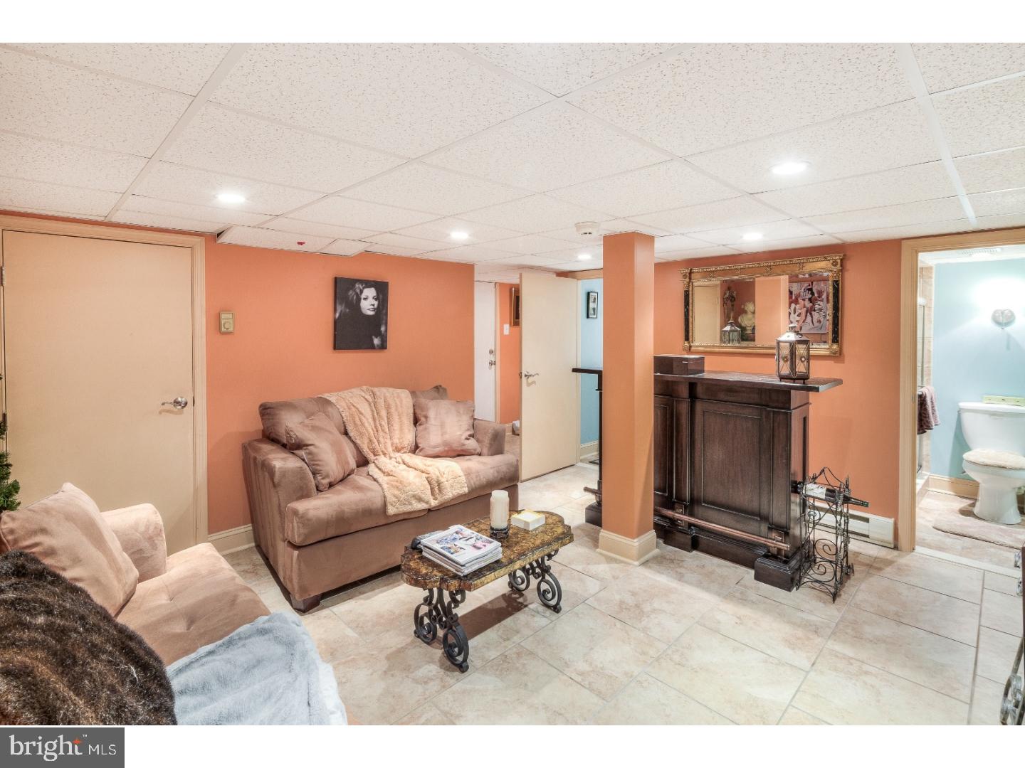 415 Earlington Road Havertown, PA 19083 - Photo 12 of 22 a living room with furniture and a table