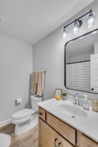 a view of house with backyard