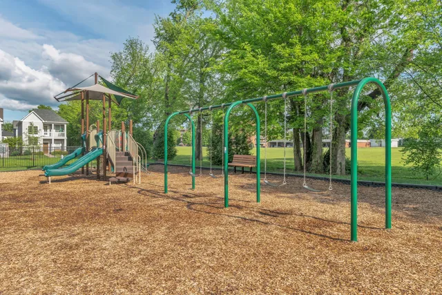 a view of a park with swings