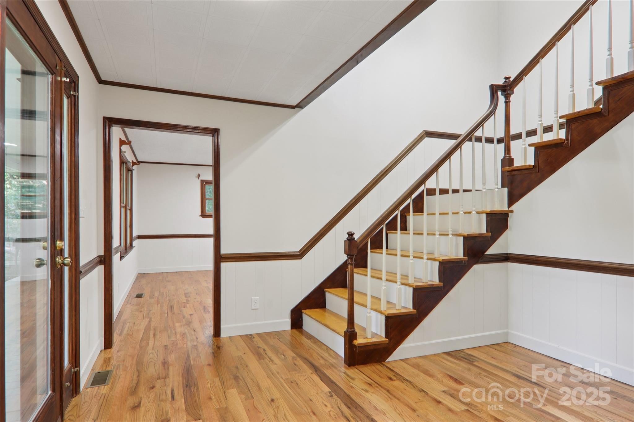 5 Timothy Lane Candler, NC 28715 - Photo 20 of 48 a view of entryway with wooden floor and stairs