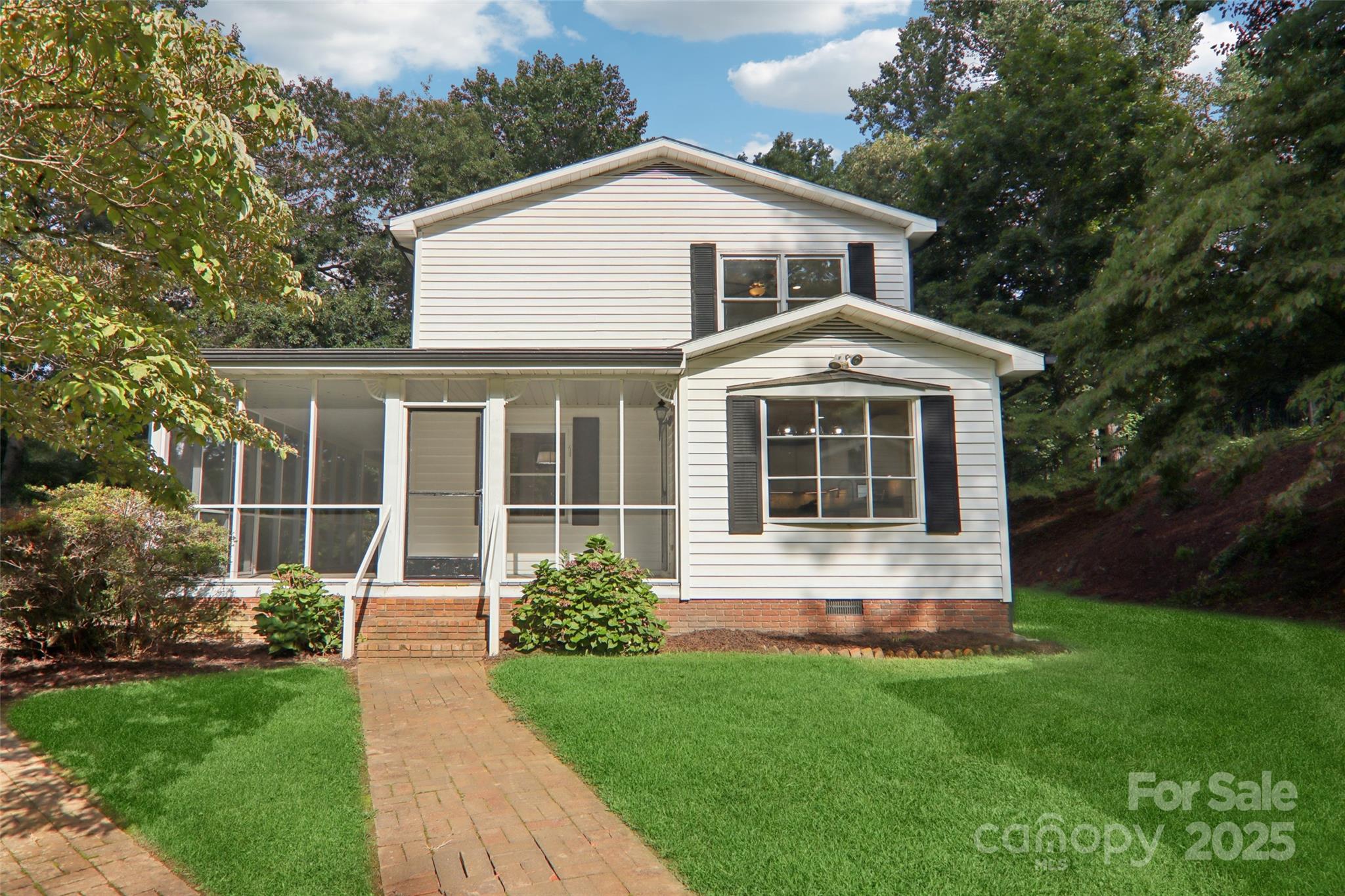 5 Timothy Lane Candler, NC 28715 - Photo 2 of 48 a front view of a house with a yard