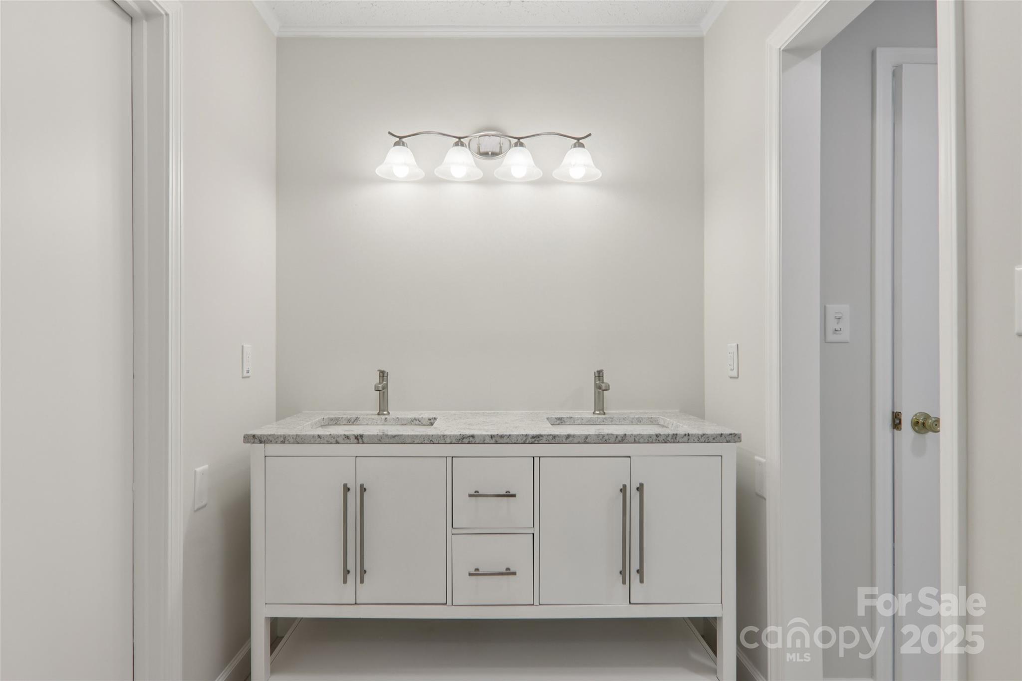 5 Timothy Lane Candler, NC 28715 - Photo 34 of 48 a bathroom with a granite countertop sink and a mirror