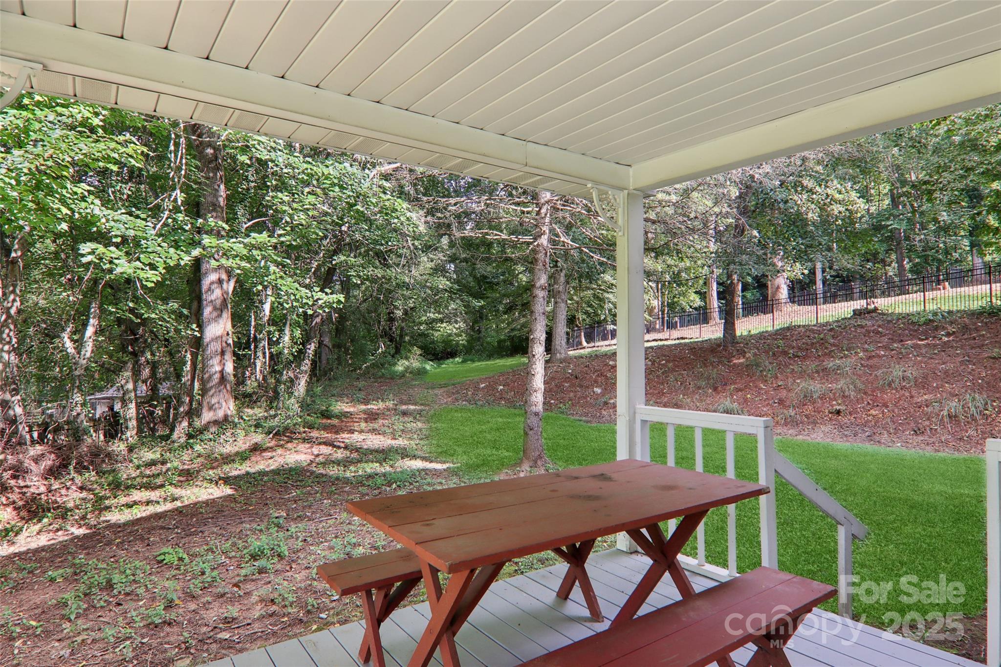 5 Timothy Lane Candler, NC 28715 - Photo 48 of 48 a view of a patio with table and chairs next to a yard