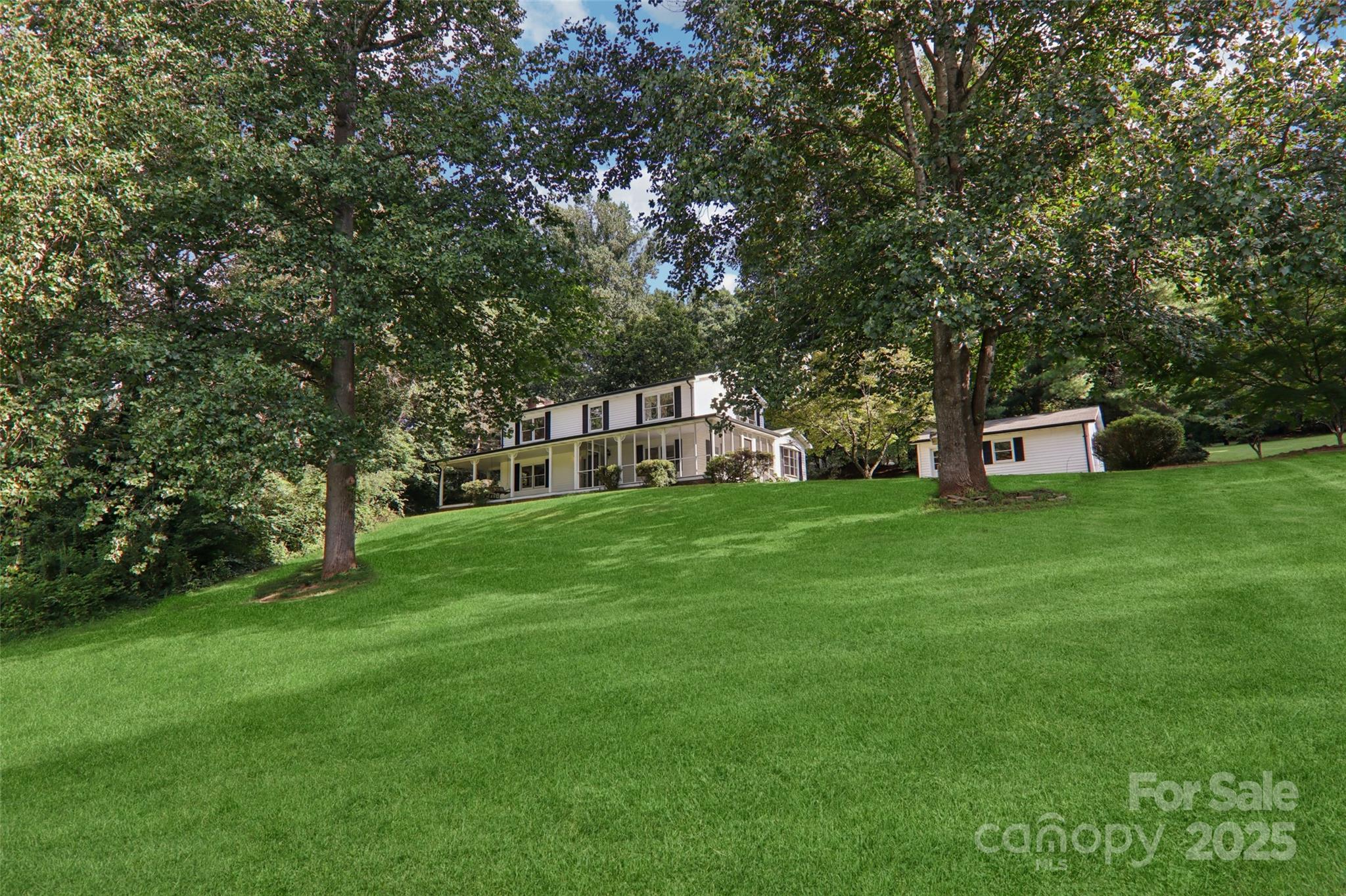 5 Timothy Lane Candler, NC 28715 - Photo 6 of 48 a view of a house with a yard