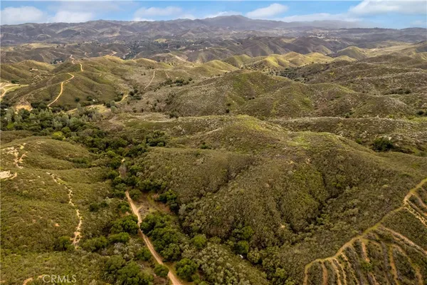 a view of a city with mountains