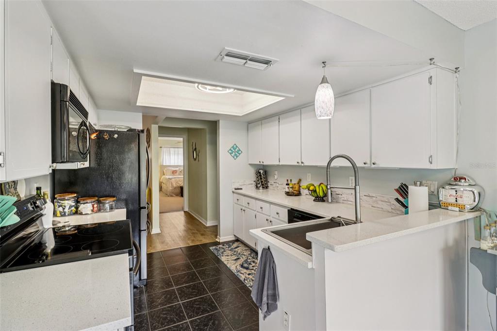 2963 Southwest 137th Place Ocala, FL 34473 - Photo 16 of 51 a kitchen with a cabinets and appliances