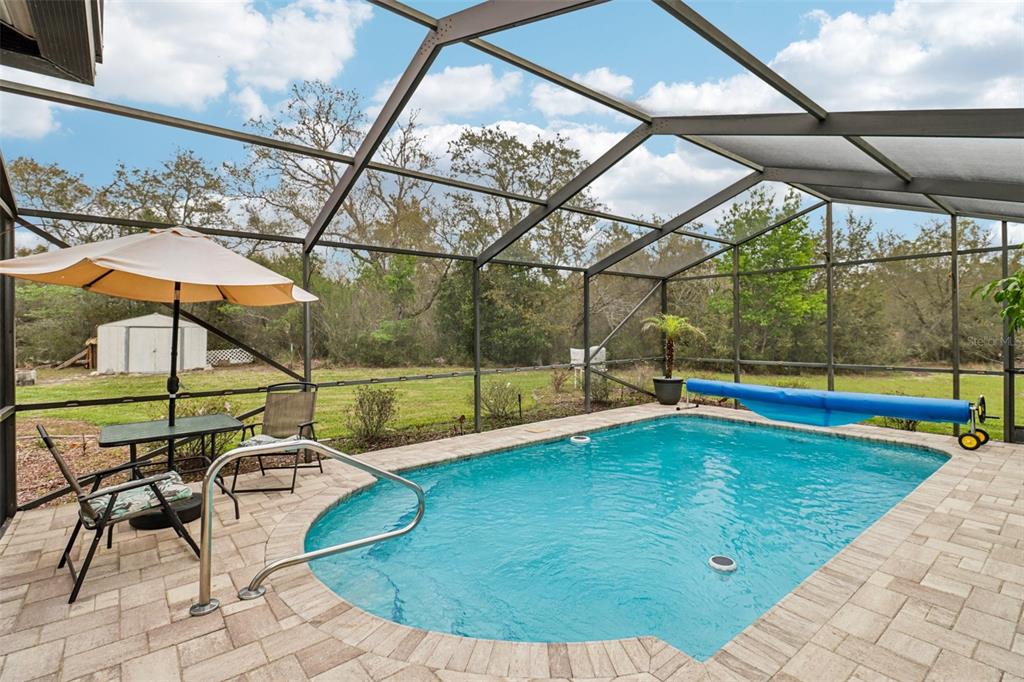 2963 Southwest 137th Place Ocala, FL 34473 - Photo 25 of 51 a view of swimming pool with a patio