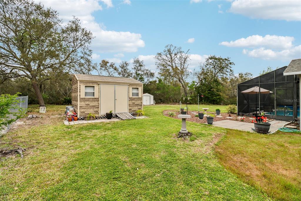 2963 Southwest 137th Place Ocala, FL 34473 - Photo 28 of 51 a view of a house with backyard and sitting area