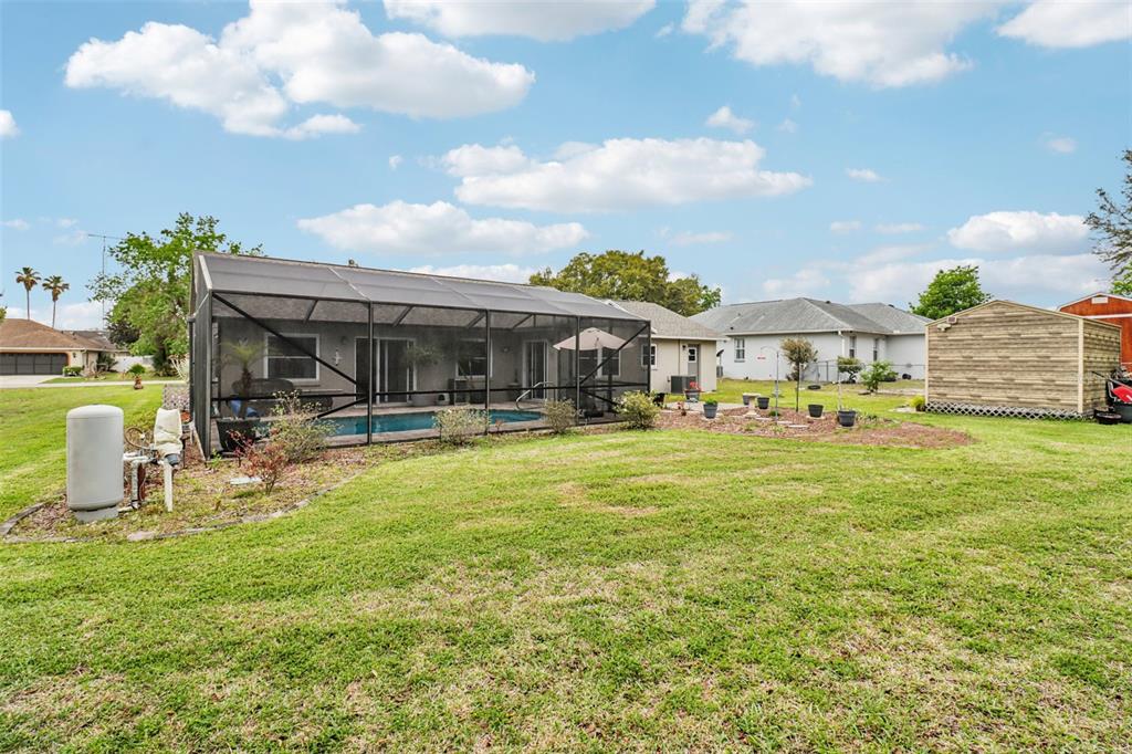 2963 Southwest 137th Place Ocala, FL 34473 - Photo 32 of 51 a front view of house with a garden