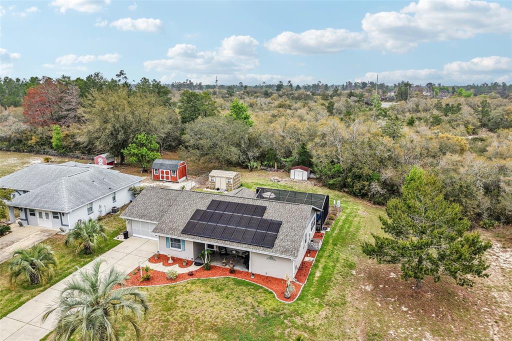 2963 Southwest 137th Place Ocala, FL 34473 - Photo 37 of 51 an aerial view of a house with a garden