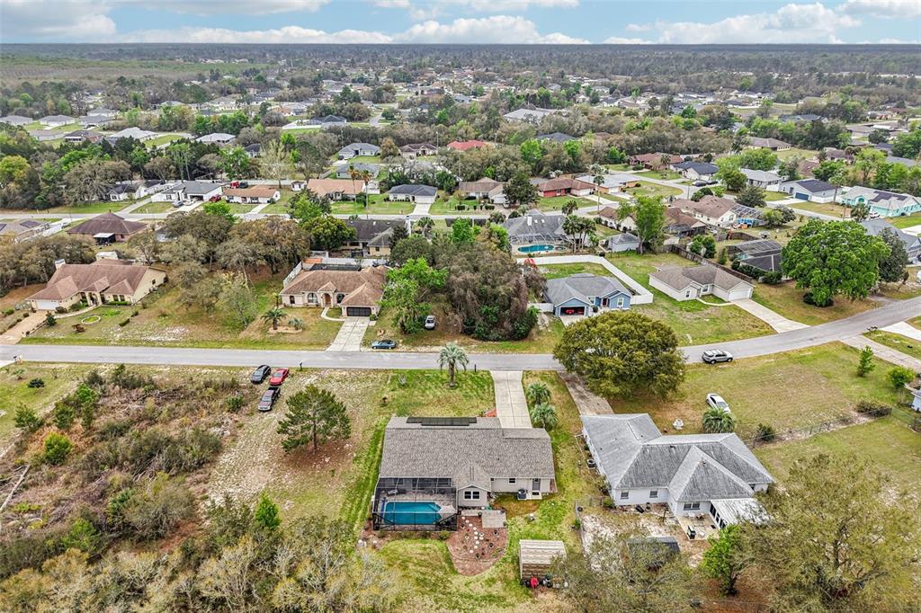 2963 Southwest 137th Place Ocala, FL 34473 - Photo 41 of 51 an aerial view of residential houses with outdoor space