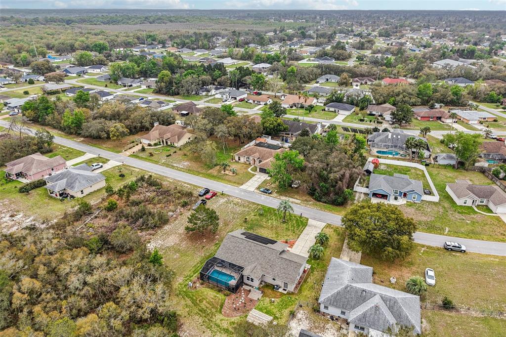 2963 Southwest 137th Place Ocala, FL 34473 - Photo 42 of 51 an aerial view of residential houses with outdoor space