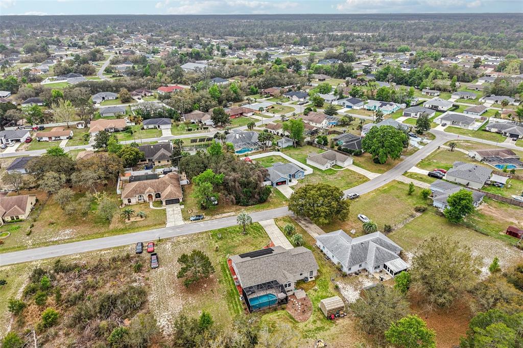 2963 Southwest 137th Place Ocala, FL 34473 - Photo 43 of 51 an aerial view of residential houses with outdoor space