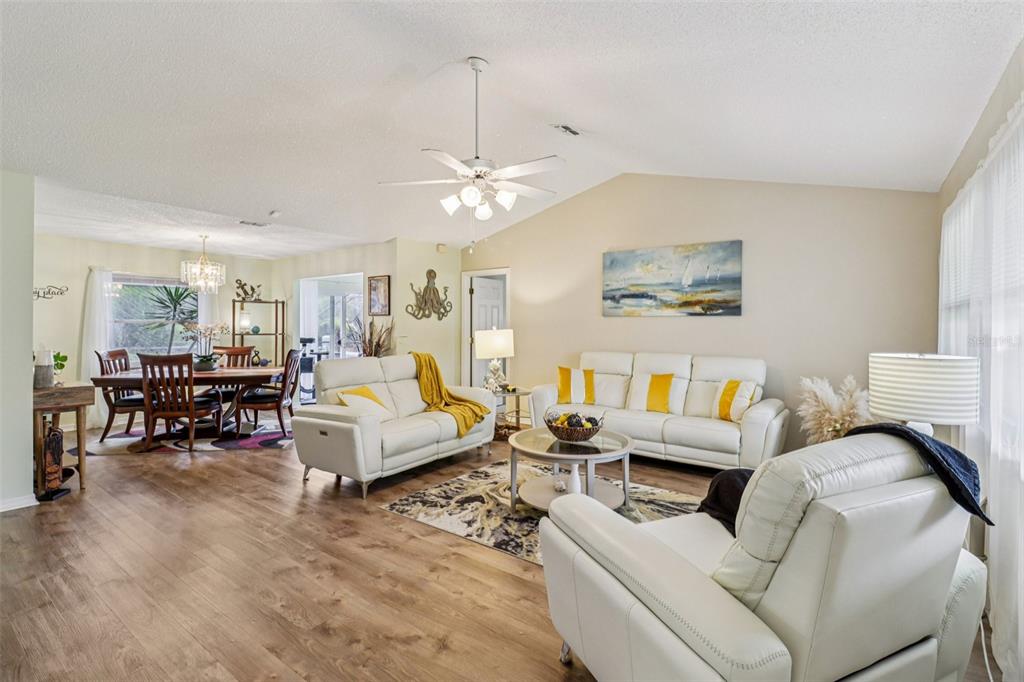 2963 Southwest 137th Place Ocala, FL 34473 - Photo 5 of 51 a living room with furniture and white walls