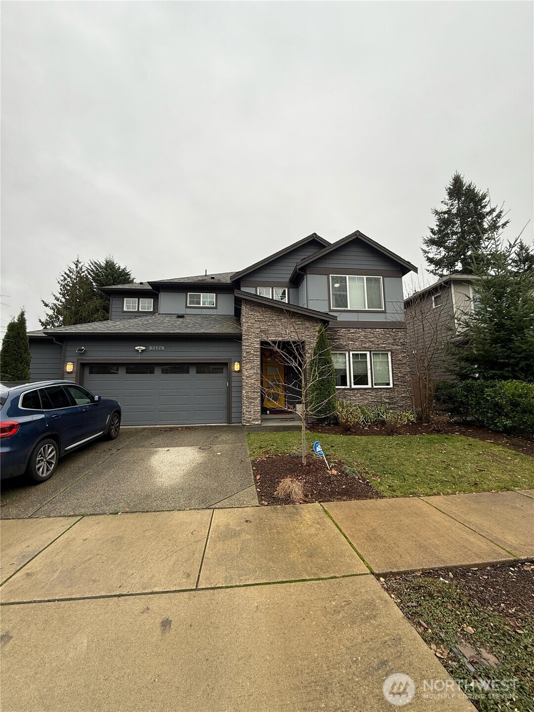3606 200th Place Southeast Bothell, WA 98012 - Photo 2 of 28 a view of a house with a patio