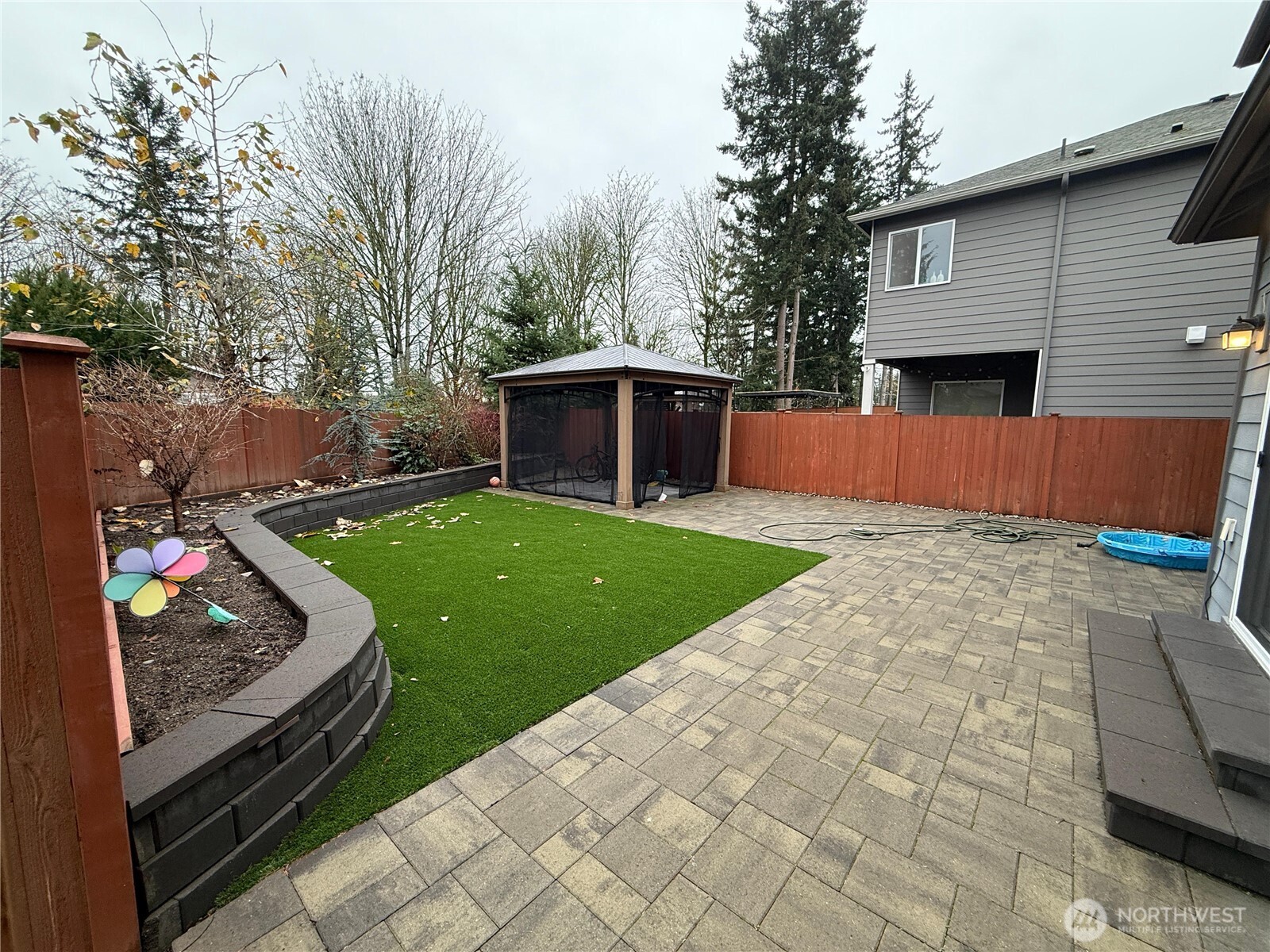 3606 200th Place Southeast Bothell, WA 98012 - Photo 26 of 28 a backyard of a house with seating space