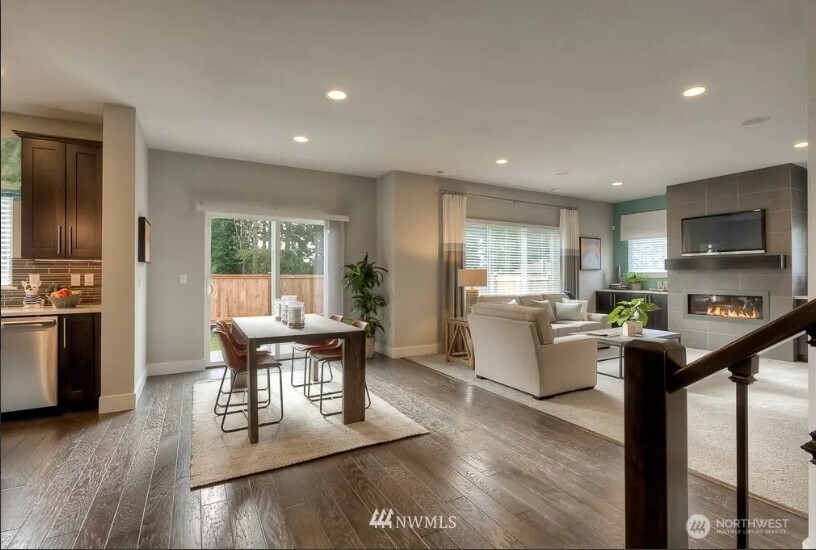 3606 200th Place Southeast Bothell, WA 98012 - Photo 6 of 28 a dining room with furniture and wooden floor