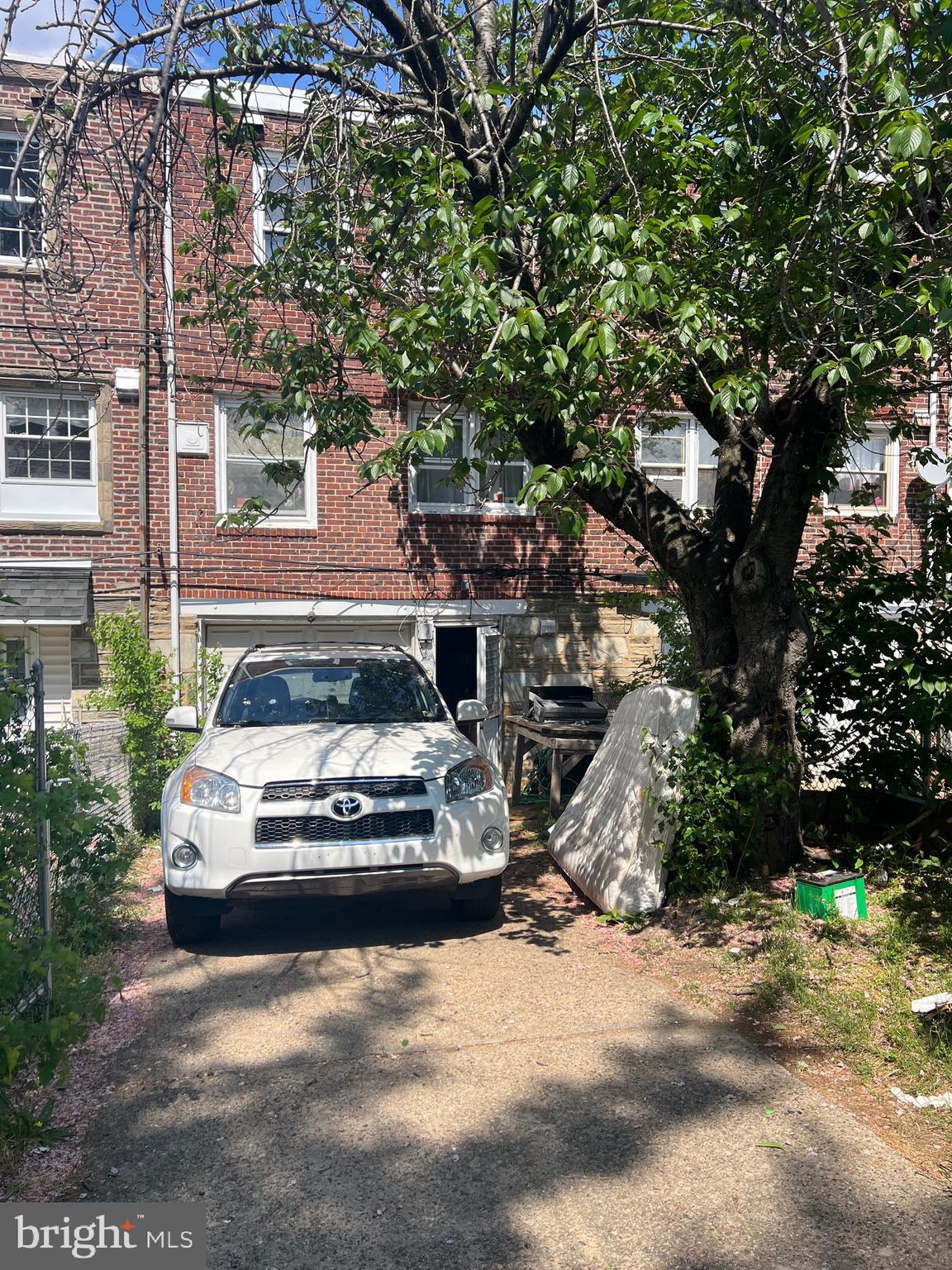 2818 Hellerman Street Philadelphia, PA 19149 - Photo 15 of 15 a car parked in front of a house
