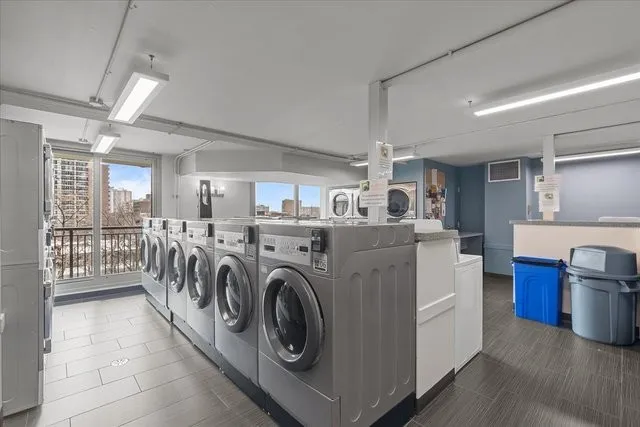 a view of a kitchen with washer and dryer