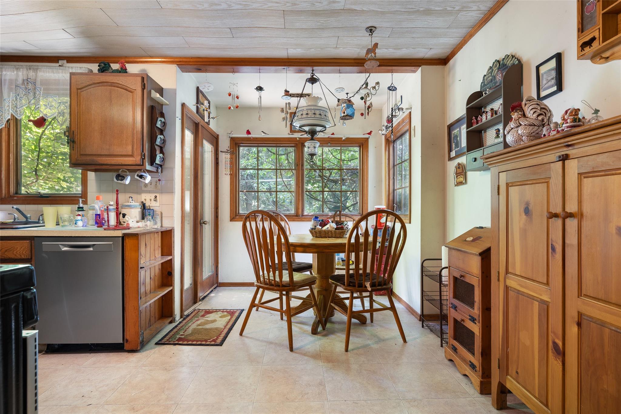 33 North Coleman Road Centereach, NY 11720 - Photo 13 of 40 Dining area with plenty of natural light and crown molding