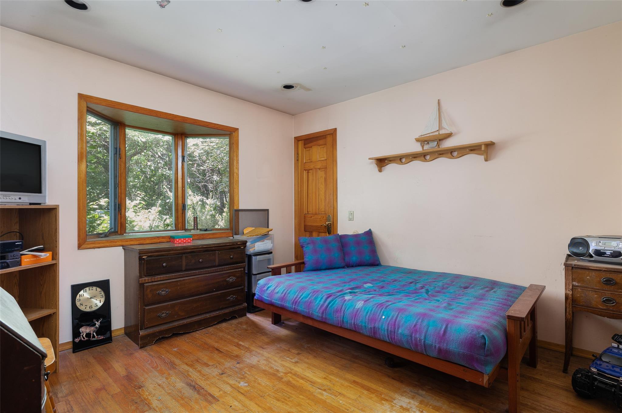 33 North Coleman Road Centereach, NY 11720 - Photo 18 of 40 Bedroom with light wood-style flooring