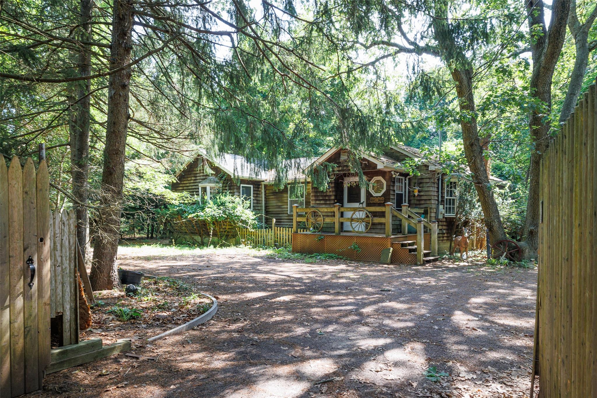 33 North Coleman Road Centereach, NY 11720 - Photo 9 of 40 View of front of house featuring a wooden deck