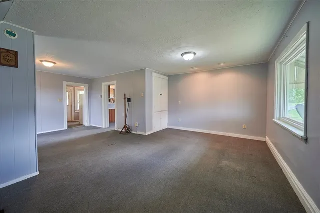 a view of empty room with windows