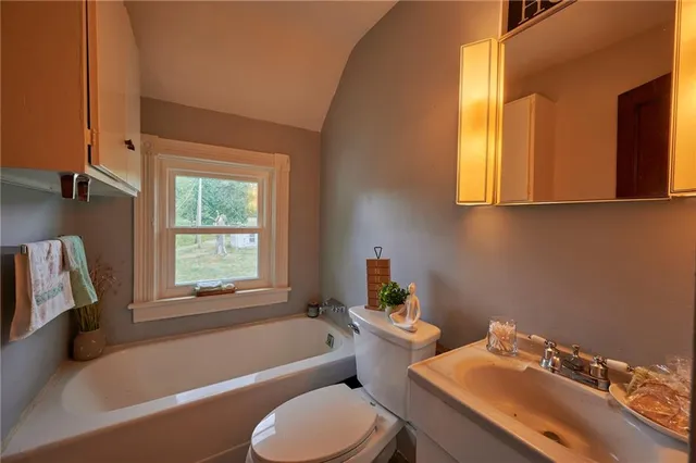a bathroom with a sink and a bathtub