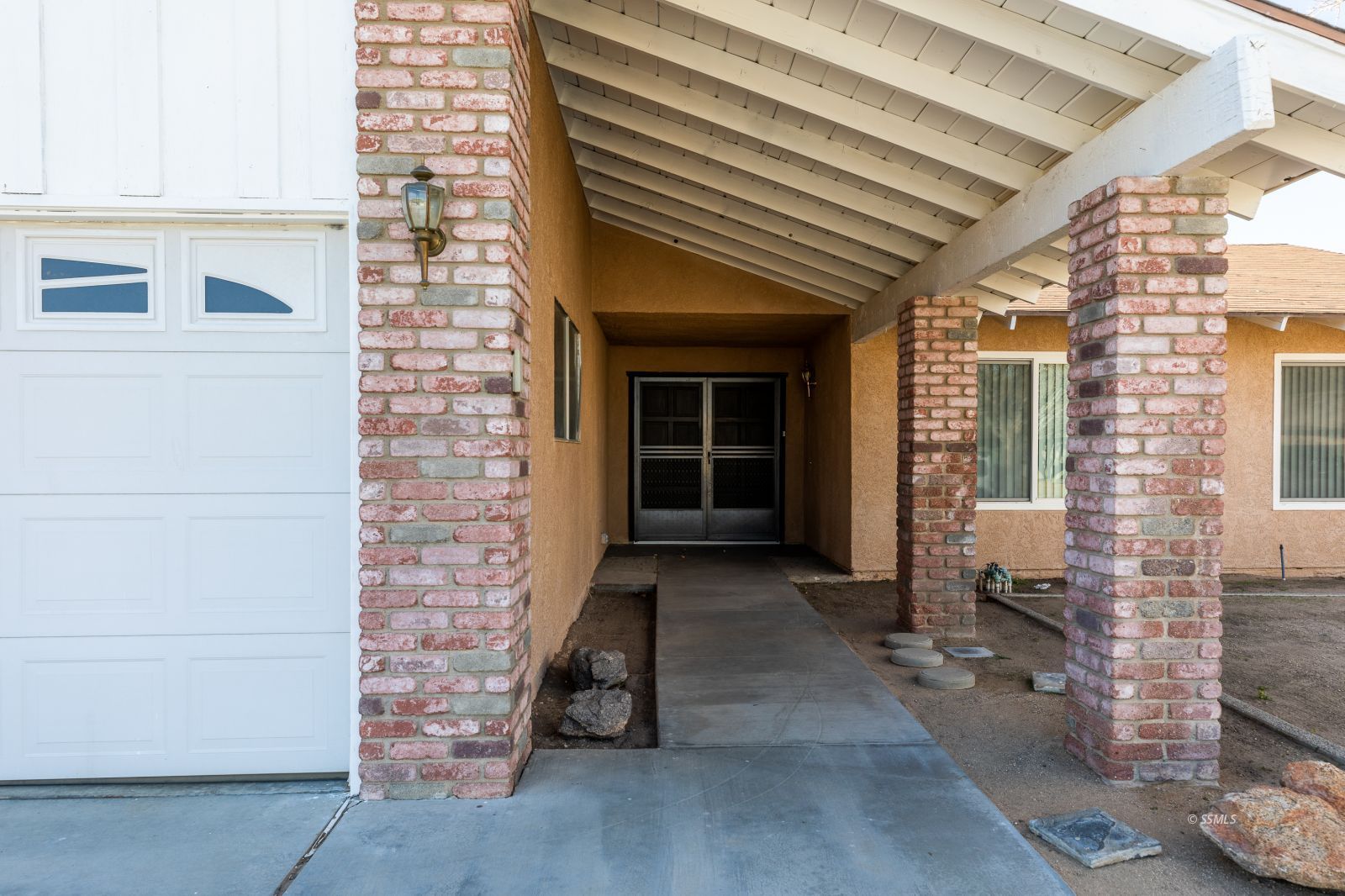 1225 North Erwin Street Ridgecrest, CA 93555 - Photo 3 of 27 a view of front door of house with stairs