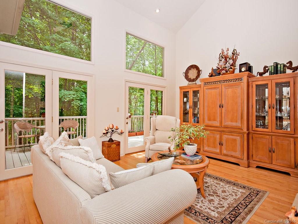 615 Brandywine Road Waynesville, NC 28786 - Photo 2 of 24 a living room with furniture large window and wooden floor