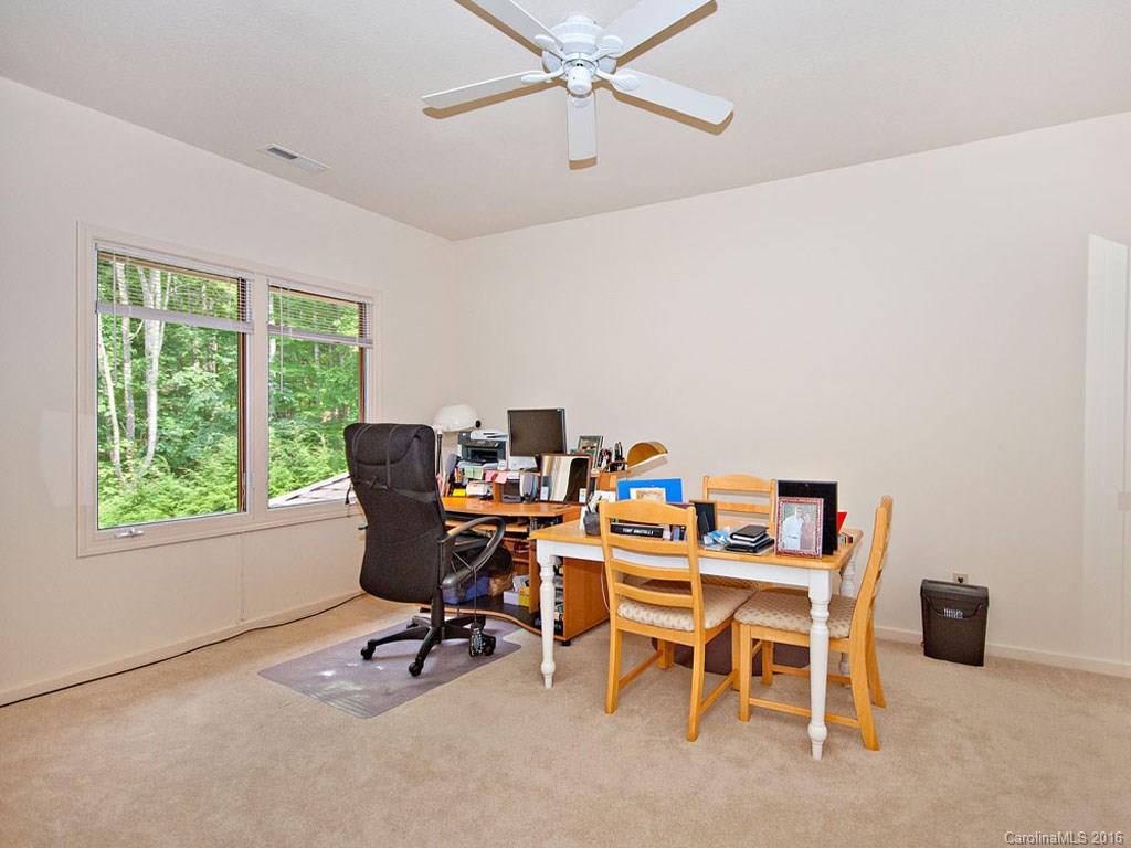 615 Brandywine Road Waynesville, NC 28786 - Photo 16 of 24 a dining room with a window and a table