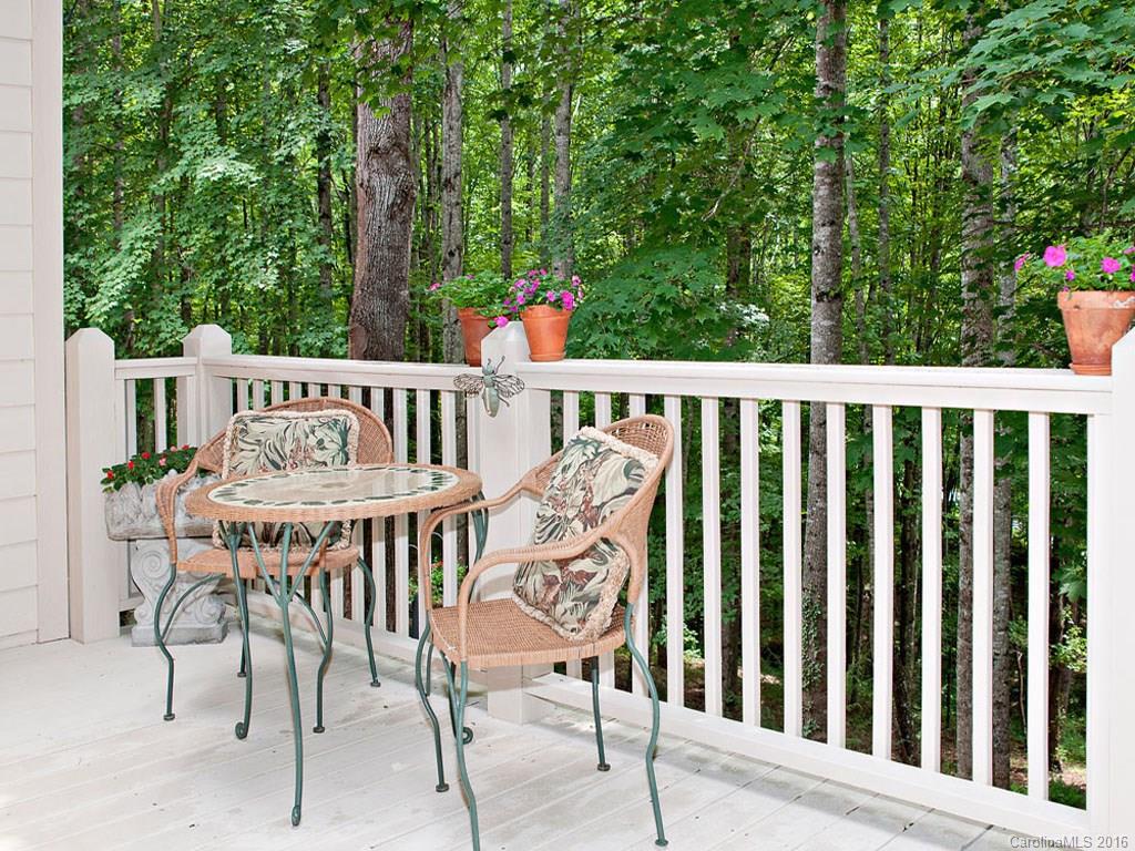 615 Brandywine Road Waynesville, NC 28786 - Photo 22 of 24 a view of a wooden bench on the roof deck