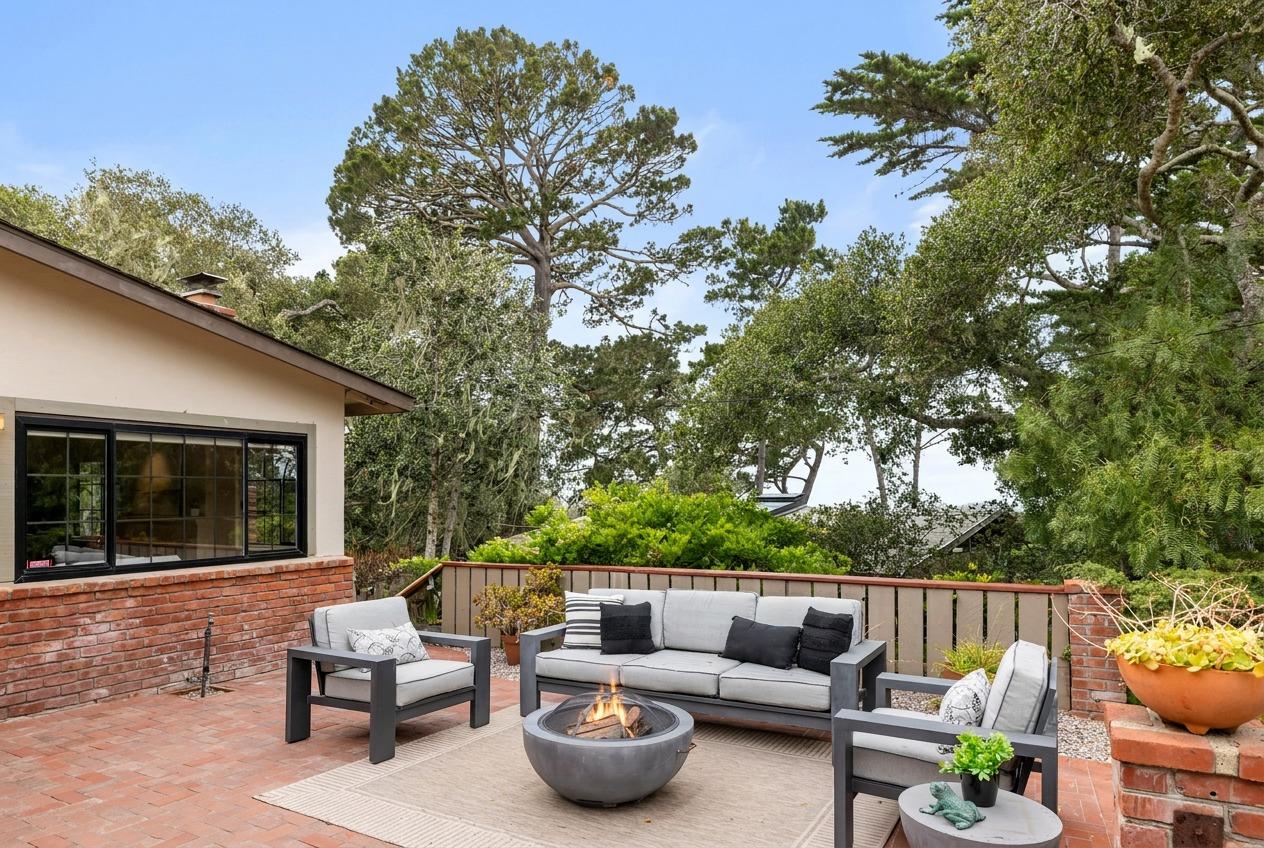 777 Parcel Street Monterey, CA 93940 - Photo 3 of 21 a view of a patio with couches chairs and a potted plant