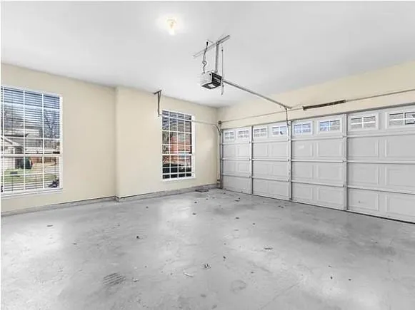 a kitchen with stainless steel appliances granite countertop a stove and a refrigerator