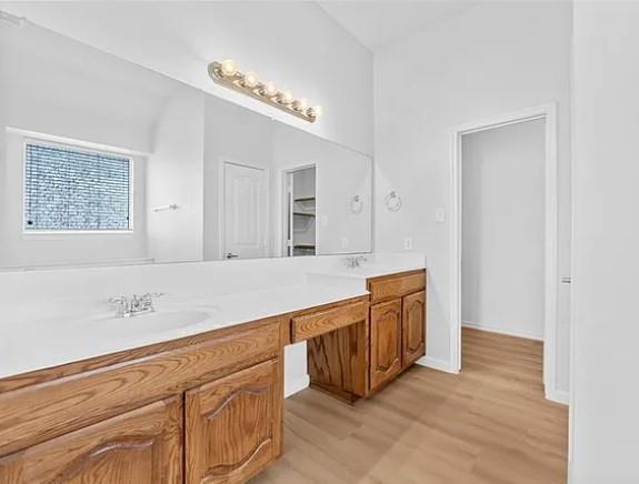 8401 Hitching Trail McKinney, TX 75070 - Photo 31 of 39 Full bath featuring double vanity and light wood-style floors