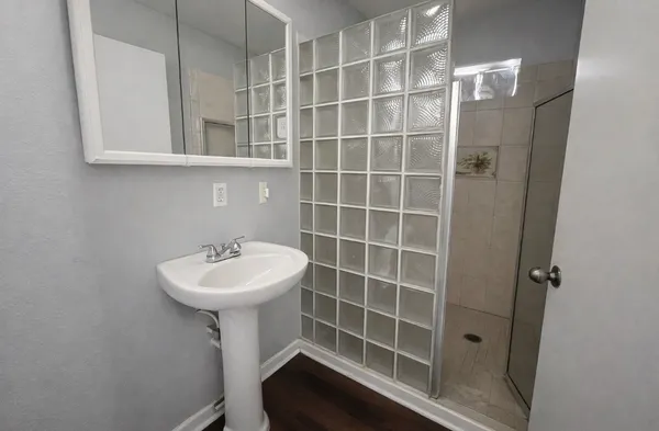 a bathroom with a sink and a mirror