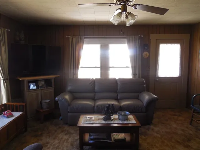 a swimming pool with wooden fence